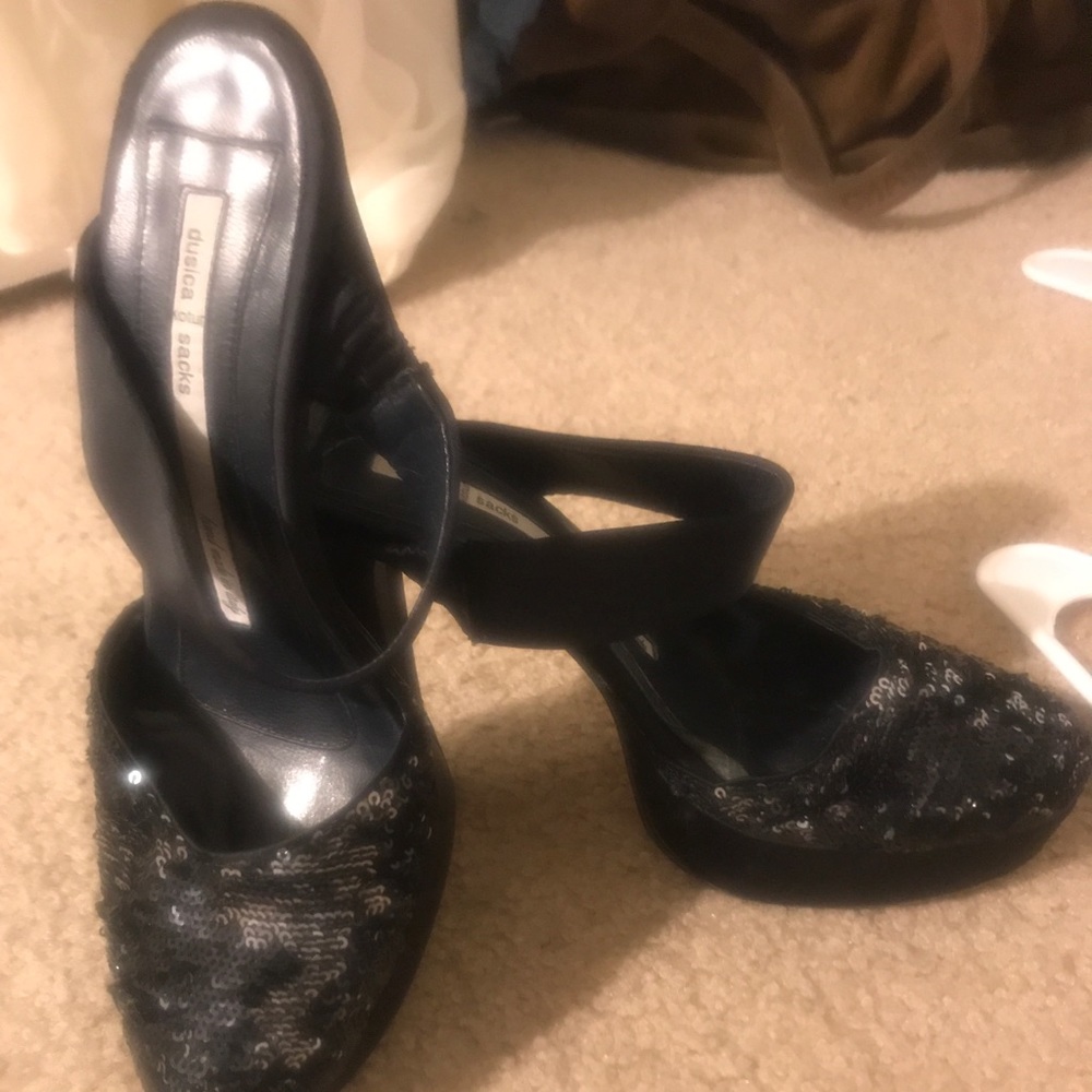 Dudu aacks sequin shoe. Goes from silver to black